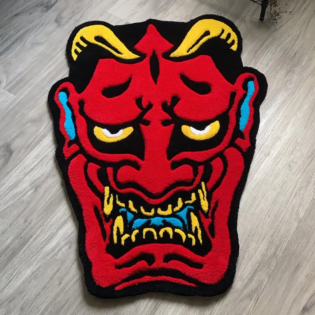 Bold Emberheart Ink Rug with fiery red Oni mask design and detailed yellow teeth – hand-tufted wool rug